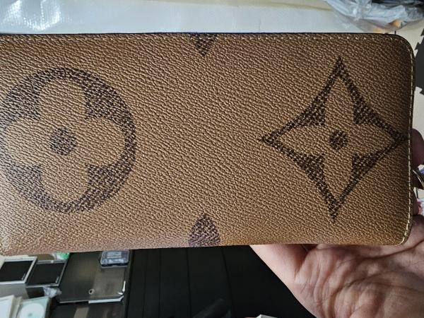 ルイヴィトン☆ジッピーウォレット 財布 偽物 モノグラムリバース ジャイアント リバース キャンバス ライニングはレザー M67687