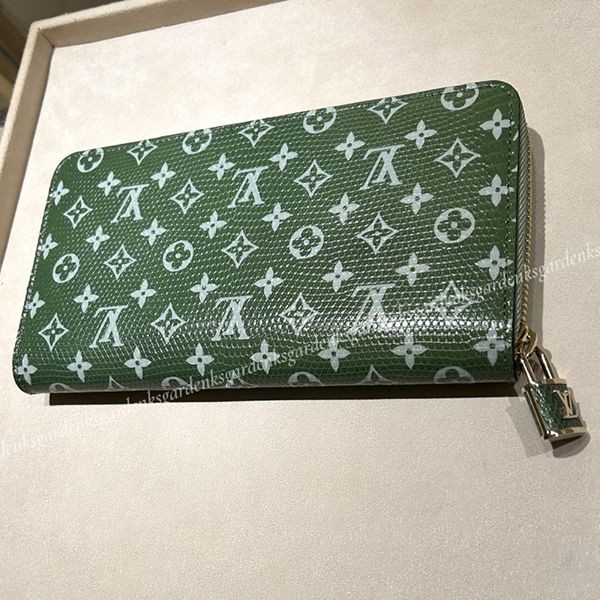 大人気!!新色!!ルイヴィトン lv リザード ジッピーウォレット 偽物 南京錠付き N96955